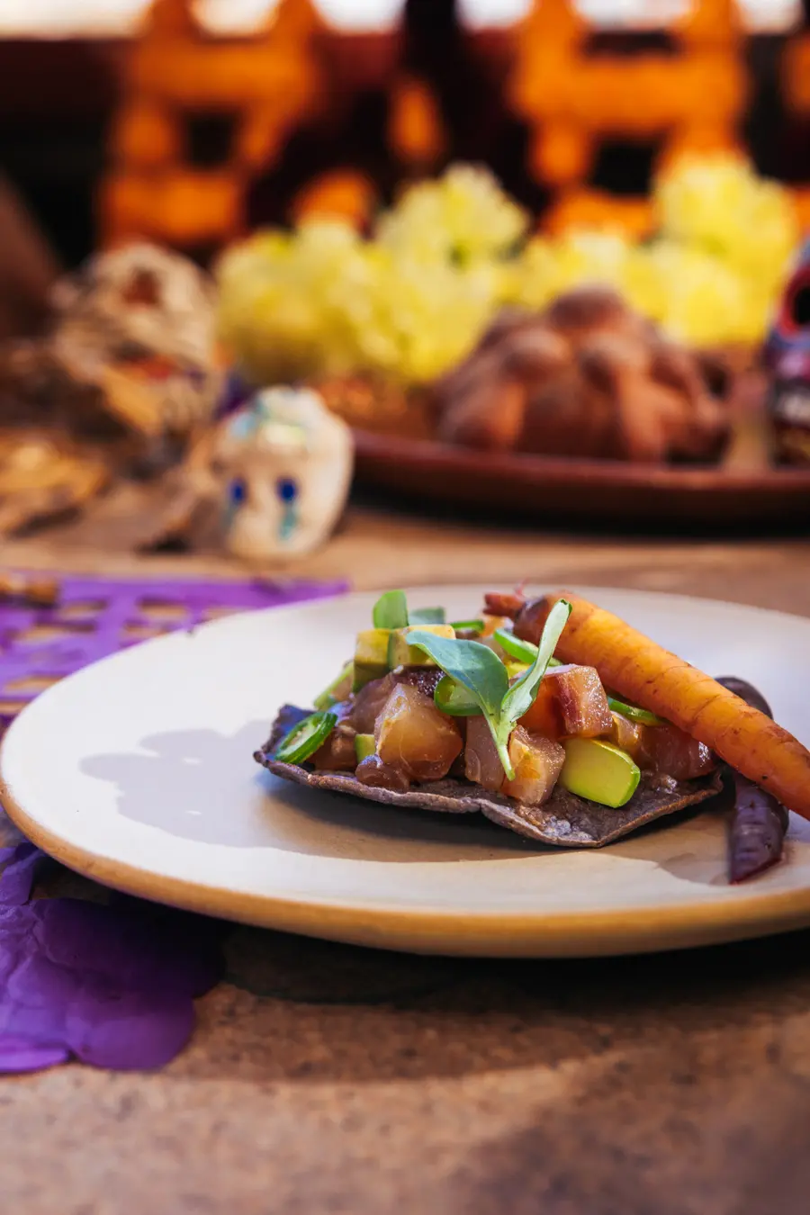 Blue corn tostada with smoked local fish